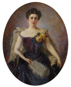 portrait of woman in turn-of-the-century attire, a purple dress with yellow roses on her left shoulder