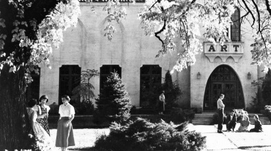 black and white photograph of a group of people standing in front of the north entry of Springville Museum of Art